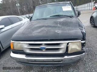 1996 Ford Ranger XL with VIN 1FTCR10A1TUD74308, listed as a IAAI auction lot 41532028 with 203,552 mi miles. Bid and sale history available at carsss.com. Image 6.