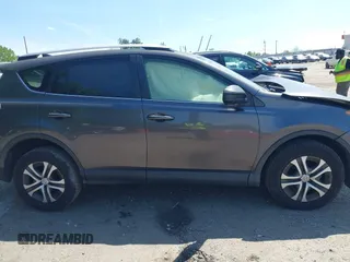 2016 Toyota RAV4 LE with VIN JTMZFREV7GJ086149, listed as a IAAI auction lot 42064251 with 90,104 mi miles and . Bid and sale history available at DreamBid. Image 13.