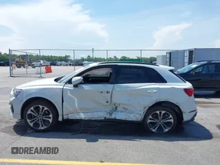 2021 Audi Q3 S line Premium Plus z VIN WA1EECF33M1024605, wystawiony jako IAAI lot #42062366 z przebiegiem 94 641 mil mil oraz . Historia ofert i sprzedaży dostępna na DreamBid. Obrazek 14.
