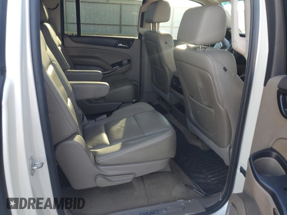 2015 GMC Yukon XL SLT with VIN 1GKS1HKC6FR166415, listed as a Copart auction lot 73029014 with 105,209 mi miles and Salvage Title. Bid and sale history available at carsss.com. Image 11.