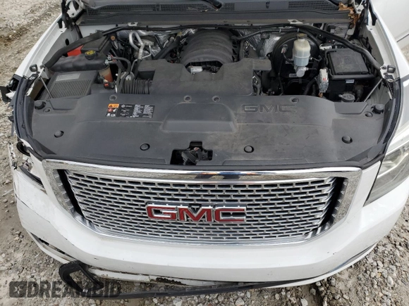 2015 GMC Yukon Denali with VIN 1GKS1CKJ1FR526594, listed as a Copart auction lot 46524205 with 99,095 mi miles and Salvage Title. Bid and sale history available at carsss.com. Image 13.