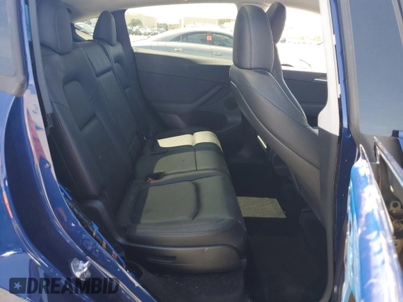 2024 Tesla Model Y Long Range z VIN 7SAYGAEE3RF034699, wystawiony jako Copart lot #54523815 z przebiegiem 9 764 mil mil oraz Szkoda całkowita • Salvage title. Historia ofert i sprzedaży dostępna na DreamBid. Obrazek 10.