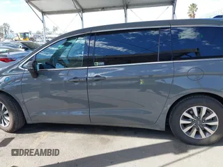 2023 Chrysler Pacifica Hybrid Touring L with VIN 2C4RC1L73PR509853, listed as a IAAI auction lot 41690872 with 83,014 mi miles and . Bid and sale history available at DreamBid. Image 15.