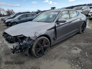 2022 Genesis G70 3.3T with VIN KMTG54TE3NU083567, listed as a Copart auction lot 77187143 with 21,343 mi miles and Clean title. Bid and sale history available at DreamBid. Image 1.