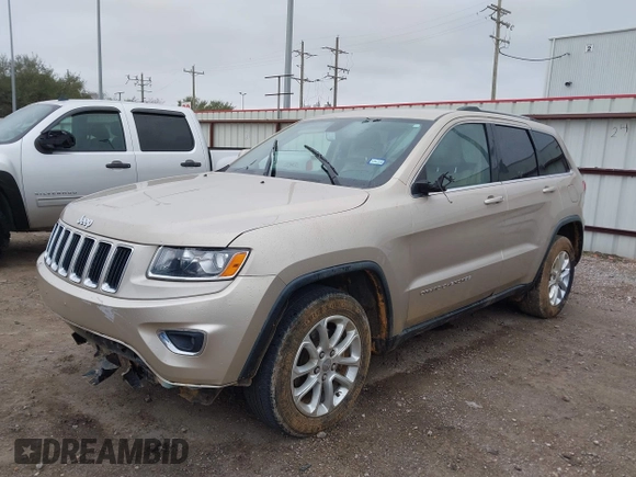 2014 Jeep Grand Cherokee Laredo with VIN 1C4RJEAG5EC424244, listed as a IAAI auction lot 41608821 with 156,251 mi miles and . Bid and sale history available at DreamBid. Image 2.