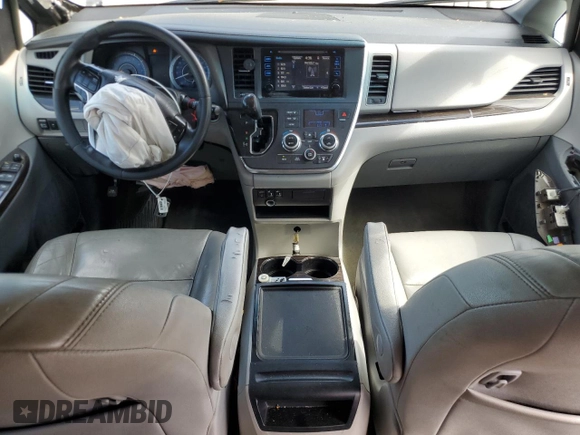 2015 Toyota Sienna XLE with VIN 5TDYK3DC5FS643985, listed as a Copart auction lot 56956505 with 179,131 mi miles and Salvage title. Bid and sale history available at DreamBid. Image 8.