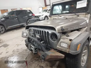 2005 Jeep Wrangler Rubicon with VIN 1J4FA69S65P311732, listed as a IAAI auction lot 41442147 with 174,277 mi miles. Bid and sale history available at carsss.com. Image 6.