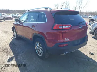 2015 Jeep Cherokee Limited with VIN 1C4PJMDS1FW646135, listed as a IAAI auction lot 41991811 with 123,229 mi miles. Bid and sale history available at carsss.com. Image 3.