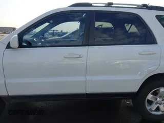 2009 Kia Sportage LX with VIN KNDJF723197622517, listed as a IAAI auction lot 41771268 with 127,112 mi miles. Bid and sale history available at carsss.com. Image 15.