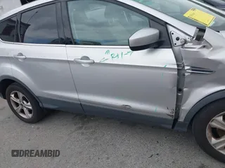 2015 Ford Escape SE with VIN 1FMCU0G95FUC81490, listed as a IAAI auction lot 42136791 with 140,967 mi miles. Bid and sale history available at carsss.com. Image 13.