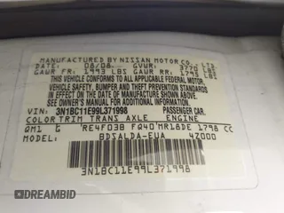 2009 Nissan Versa 1.8 S with VIN 3N1BC11E99L371998, listed as a IAAI auction lot 41723771 with 130,172 mi miles. Bid and sale history available at carsss.com. Image 9.