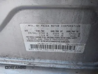 2007 Mazda Mazda3 i Sport with VIN JM1BK12F171642743, listed as a IAAI auction lot 42063089 with 228,001 mi miles. Bid and sale history available at carsss.com. Image 9.