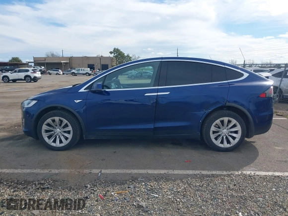 2016 Tesla Model X 70D z VIN 5YJXCAE29GF015890, wystawiony jako IAAI lot #41637564 z przebiegiem 145 848 mil mil oraz . Historia ofert i sprzedaży dostępna na DreamBid. Obrazek 14.