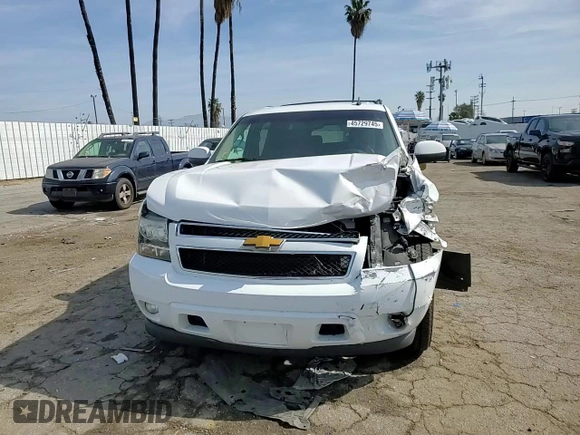 2014 Chevrolet Suburban LT with VIN 1GNSCJE00ER209005, listed as a Copart auction lot 45729745 with 129,662 mi miles and Salvage Title. Bid and sale history available at carsss.com. Image 11.