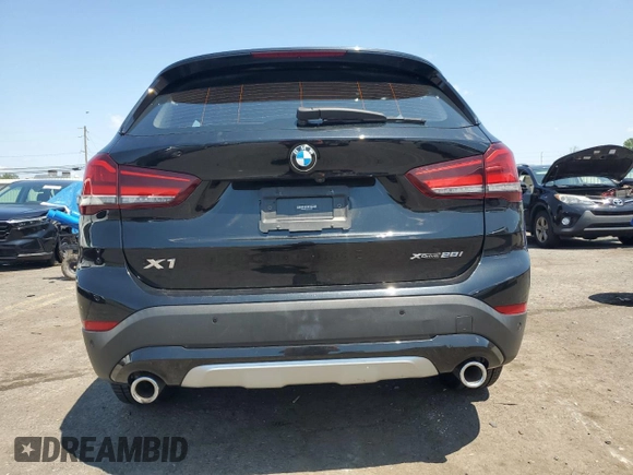 2021 BMW X1 xDrive28i with VIN WBXJG9C06M5S33201, listed as a Copart auction lot 66391015 with 53,395 mi miles and Salvage title. Bid and sale history available at DreamBid. Image 6.