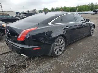 2013 Jaguar XJ Portfolio with VIN SAJWJ2GD0D8V44292, listed as a Copart auction lot 57073775 with 100,458 mi miles and Salvage Title. Bid and sale history available at DreamBid. Image 3.