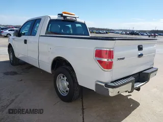 2014 Ford F-150 XL with VIN 1FTEX1CM4EKE58061, listed as a IAAI auction lot 41669258 with 195,232 mi miles. Bid and sale history available at carsss.com. Image 3.