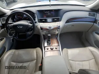 2012 Infiniti M Hybrid with VIN JN1EY1AP3CM910631, listed as a Copart auction lot 49162705 with 128,771 mi miles and Salvage title. Bid and sale history available at DreamBid. Image 8.