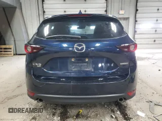 2020 Mazda CX-5 Touring z VIN JM3KFBCM5L1847751, wystawiony jako Copart lot #51189715 z przebiegiem 51 572 mil mil oraz Szkoda całkowita • Salvage title. Historia ofert i sprzedaży dostępna na DreamBid. Obrazek 6.