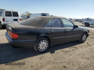 1998 Mercedes-Benz E-Class with VIN WDBJF65F4WA646422, listed as a Copart auction lot 88982785 with 281,524 mi miles and Salvage Title. Bid and sale history available at carsss.com. Image 3.