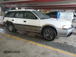 1997 Subaru Legacy Outback with VIN 4S3BG6856V6626390, listed as a Copart auction lot 54348175 with Not provided miles and Salvage title. Bid and sale history available at DreamBid. Image 4.