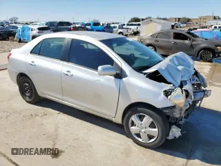 2012 Toyota Yaris with VIN JTDBT4K33C1416217, listed as a Copart auction lot 46714115 with 212,894 mi miles and Salvage Title. Bid and sale history available at DreamBid. Image 4.
