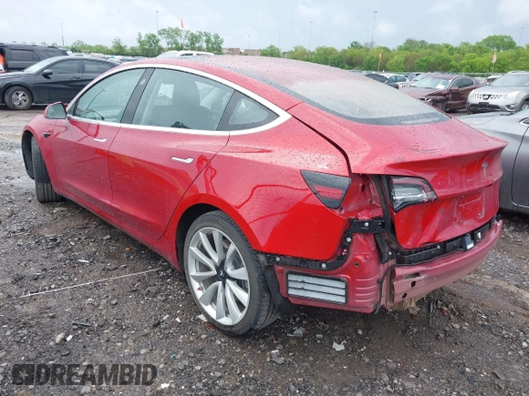2018 Tesla Model 3 Long Range Battery with VIN 5YJ3E1EA6JF052659, listed as a IAAI auction lot 42093903 with 49,255 mi miles and . Bid and sale history available at DreamBid. Image 3.