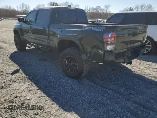2021 Toyota Tacoma 4WD SR5 with VIN 3TMDZ5BN3MM111433, listed as a Copart auction lot 47736135 with 73,061 mi miles and Salvage Title. Bid and sale history available at carsss.com. Image 2.