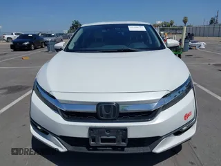 2018 Honda Clarity z VIN JHMZC5F10JC015706, wystawiony jako IAAI lot #42290573 z przebiegiem 158 987 mil mil oraz . Historia ofert i sprzedaży dostępna na DreamBid. Obrazek 12.