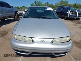2004 Oldsmobile Alero GL1 z VIN 1G3NL52F54C206964, wystawiony jako IAAI lot #42160307 z przebiegiem 129 808 mil mil oraz . Historia ofert i sprzedaży dostępna na DreamBid. Obrazek 12.