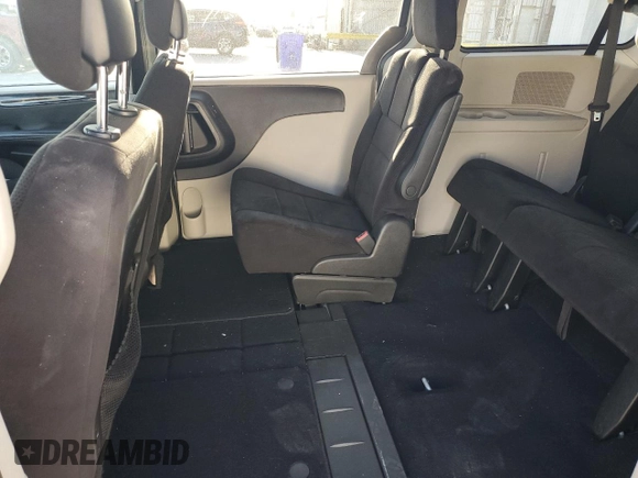 2014 Dodge Grand Caravan SXT with VIN 2C4RDGCG1ER121033, listed as a Copart auction lot 52030715 with 105,451 mi miles and Salvage Title. Bid and sale history available at DreamBid. Image 11.