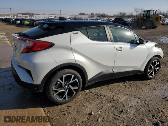 2019 Toyota C-HR XLE z VIN JTNKHMBX4K1061895, wystawiony jako Copart lot #49095605 z przebiegiem 109 974 mil mil oraz Szkoda całkowita • Salvage title. Historia ofert i sprzedaży dostępna na DreamBid. Obrazek 3.