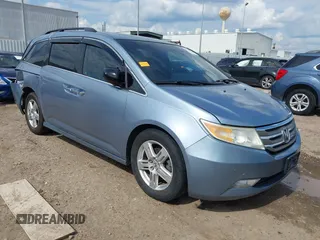 2011 Honda Odyssey Touring с VIN 5FNRL5H92BB033245, выставлен на аукционе IAAI как лот 42226287 с пробегом 184 910 миль миль и . История ставок и продаж доступна на DreamBid. Изображение 1.