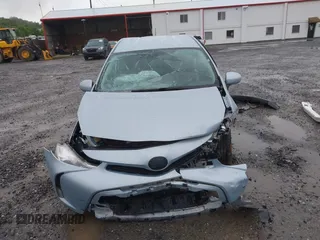 2016 Toyota Prius Two z VIN JTDZN3EUXGJ053220, wystawiony jako IAAI lot #42318675 z przebiegiem Nie podano mil oraz . Historia ofert i sprzedaży dostępna na DreamBid. Obrazek 13.