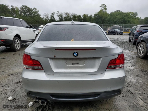 2011 BMW 1 Series 135i with VIN WBAUC9C56BVM09045, listed as a Copart auction lot 73316874 with 125,679 mi miles and Salvage Title. Bid and sale history available at carsss.com. Image 6.