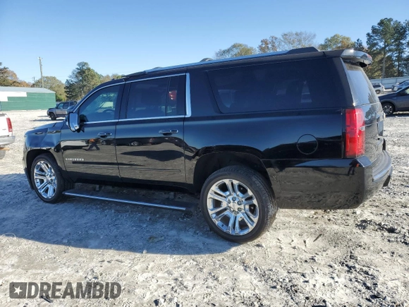 2019 Chevrolet Suburban Premier with VIN 1GNSKJKJXKR323704, listed as a Copart auction lot 72757214 with 150,404 mi miles and Salvage Title. Bid and sale history available at DreamBid. Image 2.