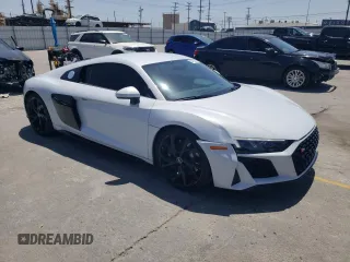 2023 Audi R8 performance quattro z VIN WUACEAFX9P7900103, wystawiony jako Copart lot #57456835 z przebiegiem 5 220 mil mil oraz Szkoda całkowita • Salvage title. Historia ofert i sprzedaży dostępna na DreamBid. Obrazek 4.