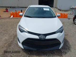 2019 Toyota Corolla L with VIN 5YFBURHE8KP949824, listed as a IAAI auction lot 41904385 with 112,054 mi miles. Bid and sale history available at carsss.com. Image 12.