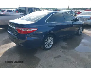 2015 Toyota Camry XLE with VIN 4T4BF1FK2FR467882, listed as a IAAI auction lot 42058933 with 126,022 mi miles and . Bid and sale history available at carsss.com. Image 4.