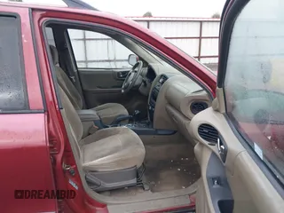 2004 Hyundai Santa Fe GLS with VIN KM8SC73DX4U640640, listed as a IAAI auction lot 41803501 with 149,924 mi miles. Bid and sale history available at carsss.com. Image 5.