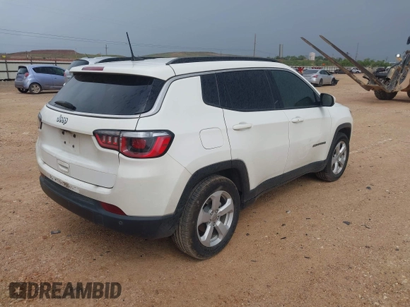 2019 Jeep Compass Latitude with VIN 3C4NJCBB3KT802907, listed as a IAAI auction lot 42595157 with 103,993 mi miles and . Bid and sale history available at DreamBid. Image 4.