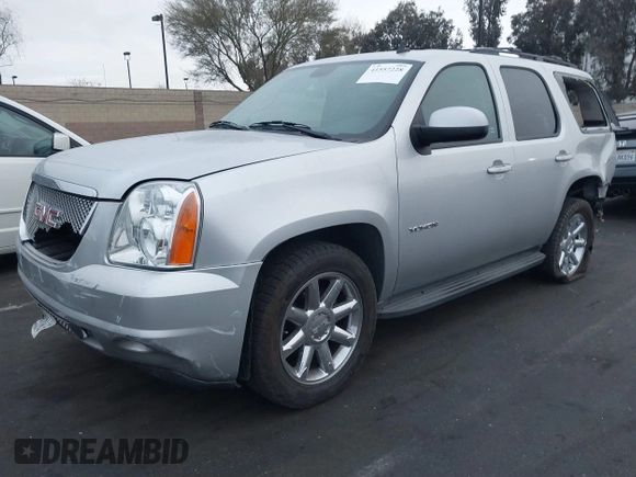 2013 GMC Yukon SLT with VIN 1GKS1CE07DR157076, listed as a IAAI auction lot 41557228 with 148,242 mi miles. Bid and sale history available at carsss.com. Image 18.