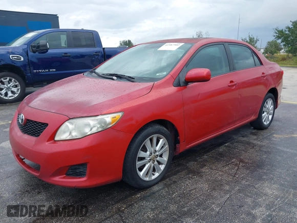 2009 Toyota Corolla with VIN 1NXBU40E39Z022074, listed as a IAAI auction lot 41987902 with 121,206 mi miles. Bid and sale history available at carsss.com. Image 2.