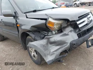 2007 Honda Pilot EX-L z VIN 2HKYF18587H511816, wystawiony jako IAAI lot #42366623 z przebiegiem 170 866 mil mil oraz . Historia ofert i sprzedaży dostępna na DreamBid. Obrazek 6.