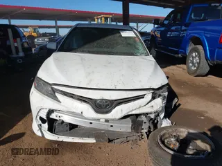 2020 Toyota Camry LE with VIN 4T1C11AK7LU401666, listed as a IAAI auction lot 41865235 with 69,189 mi miles. Bid and sale history available at carsss.com. Image 12.