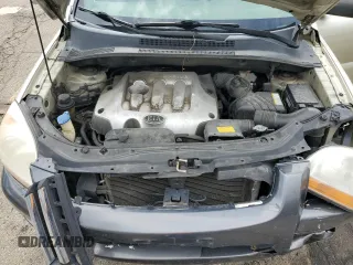 2006 Kia Sportage LX z VIN KNDJF724667293852, wystawiony jako Copart lot #58573485 z przebiegiem 212 470 mil mil oraz Szkoda całkowita • Salvage title. Historia ofert i sprzedaży dostępna na DreamBid. Obrazek 11.