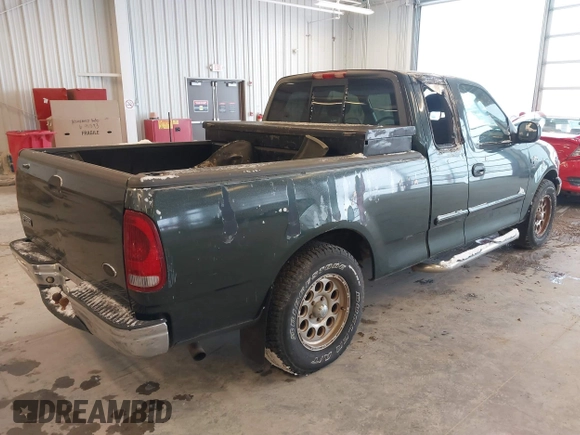 2003 Ford F-150 XL with VIN 2FTRX17273CA22817, listed as a IAAI auction lot 41579246 with 0 mi miles. Bid and sale history available at carsss.com. Image 4.