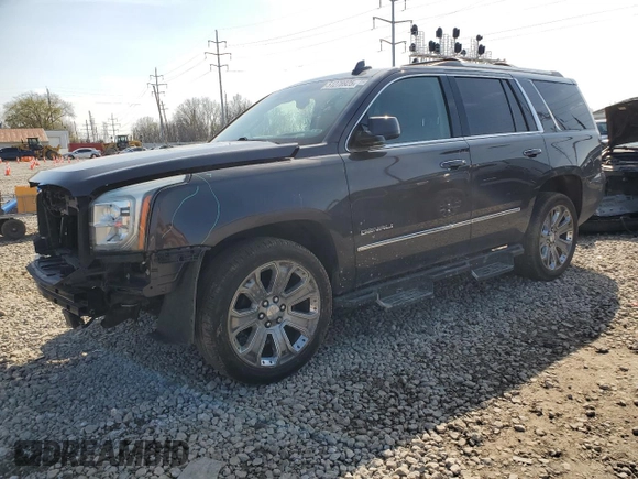 2015 GMC Yukon Denali with VIN 1GKS2CKJXFR539714, listed as a Copart auction lot 51278925 with 129,254 mi miles and Salvage Title. Bid and sale history available at carsss.com. Image 1.