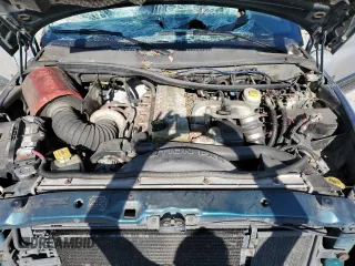 1999 Dodge 2500 z VIN 1B7KF2360XJ585301, wystawiony jako Copart lot #58319385 z przebiegiem 318 952 mil mil oraz Szkoda całkowita • Salvage title. Historia ofert i sprzedaży dostępna na DreamBid. Obrazek 11.