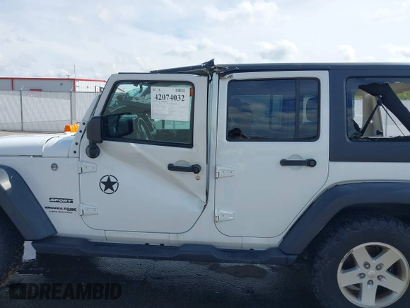 2018 Jeep Wrangler Unlimited Sport S with VIN 1C4BJWDG3JL810853, listed as a IAAI auction lot 42074032 with 141,942 mi miles and . Bid and sale history available at DreamBid. Image 14.